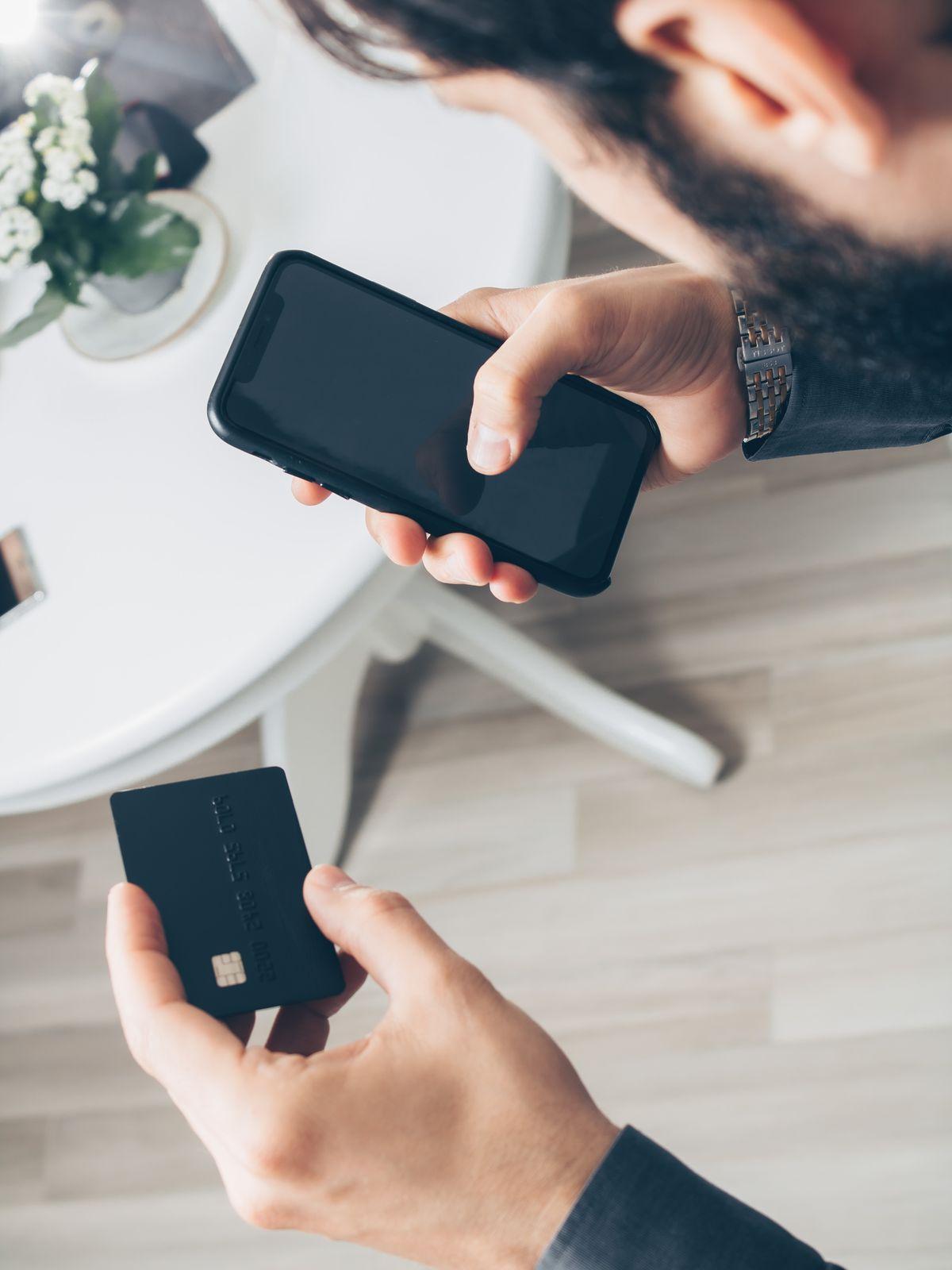 A person managing their money securely from their phone